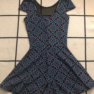 Kaleidoscope printed romper w/ mesh cutout